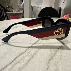 Gucci sunglasses. Thick cat eye frames